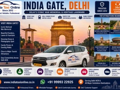 India Gate illuminated at Kartavya Path with National War Memorial and landscaped gardens in New Delhi.
