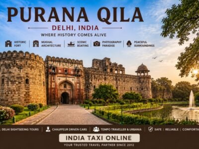 Historic Purana Qila in New Delhi featuring massive stone walls, ancient gateways and landscaped gardens under a clear blue sky